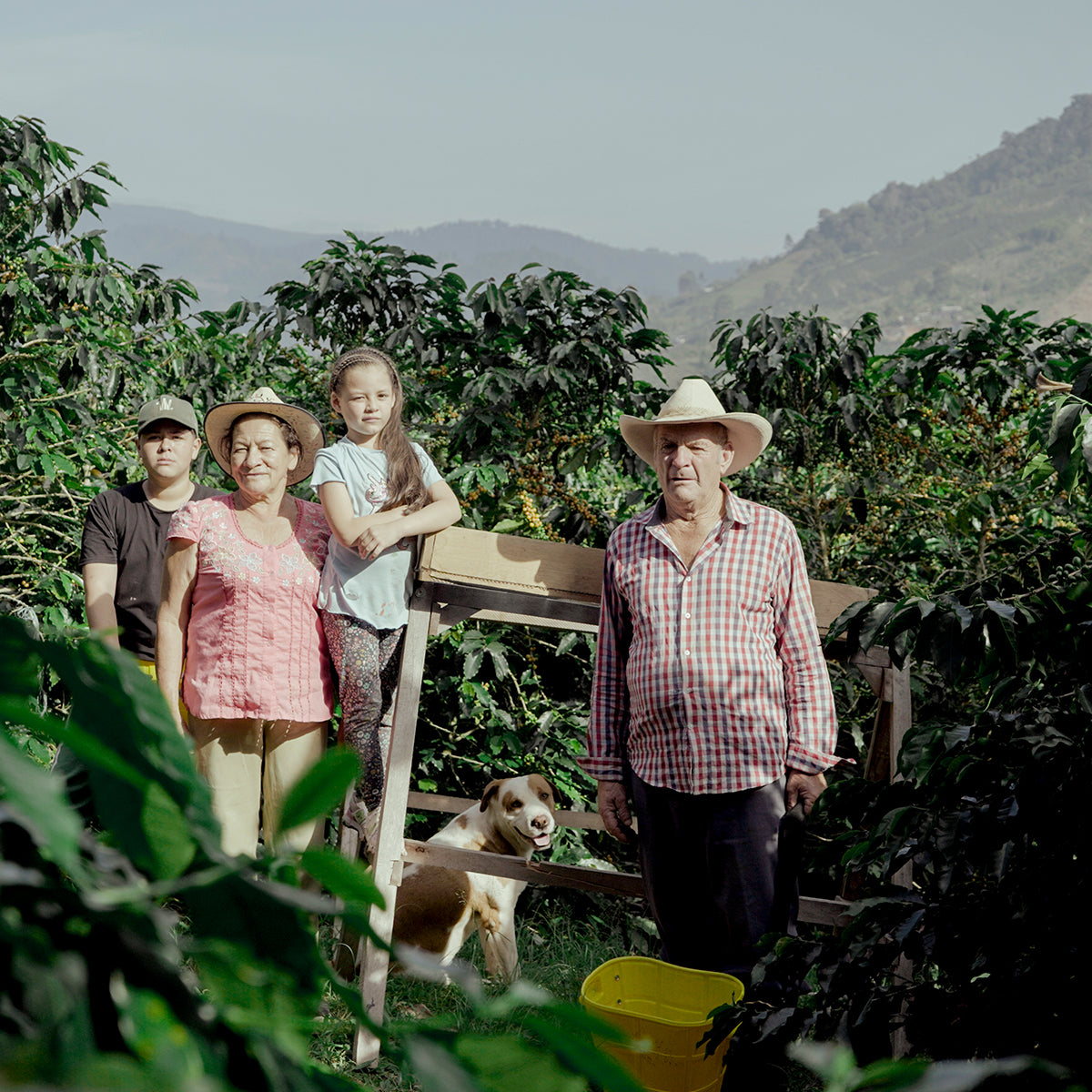 Segundo Aurelio Lasso with his wife and two children and dog at their farm